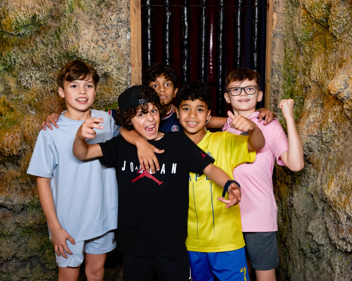 Group of boys posing for a photo at a TEPfactor birthday party in JBR